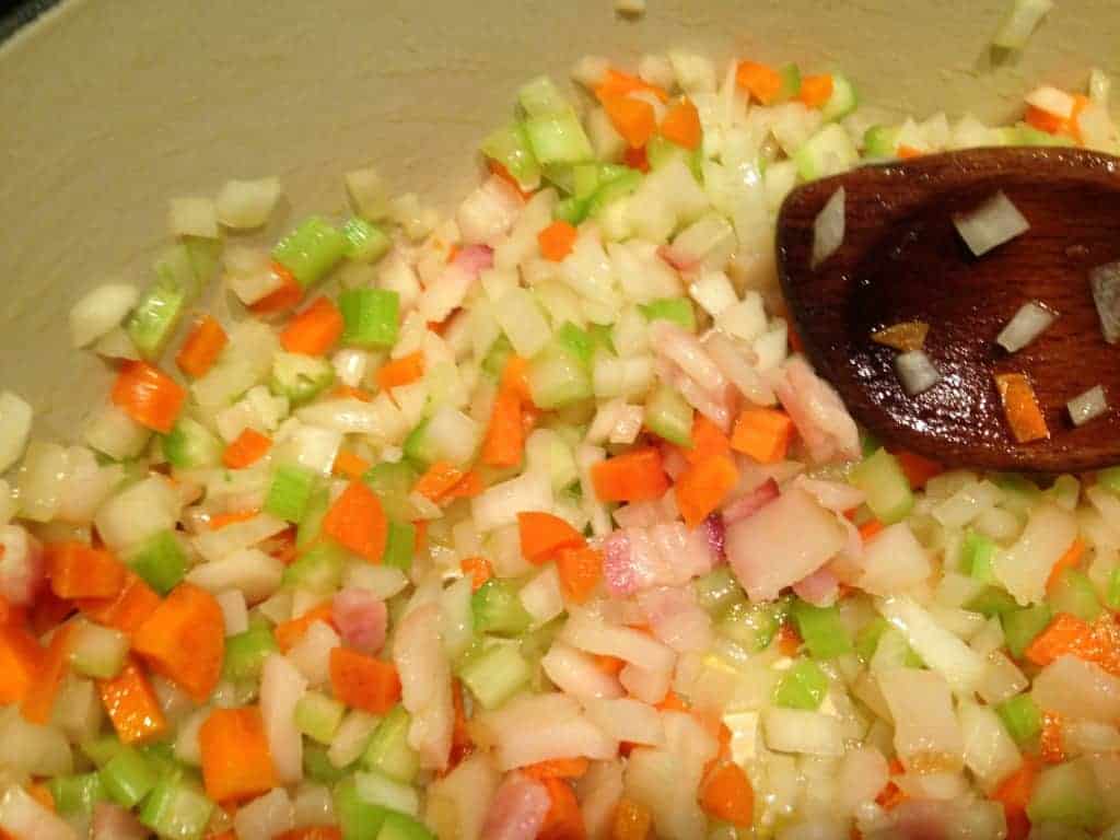 Cooking onions, carrots, and celery for Bolognese sauce