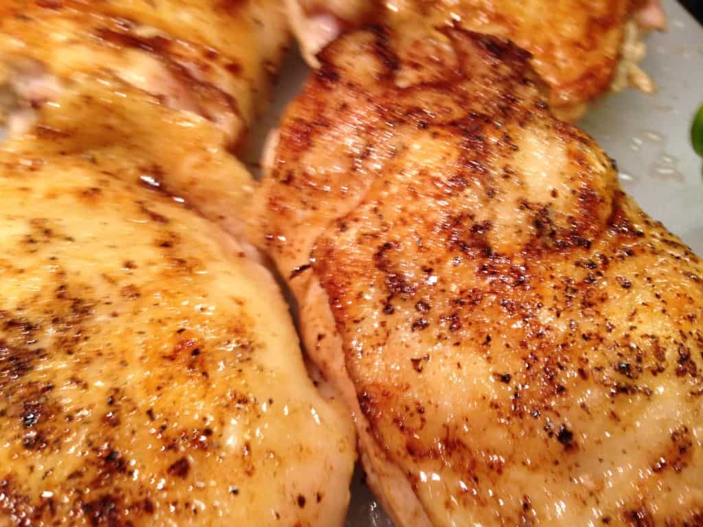 Well-browned chicken thighs.