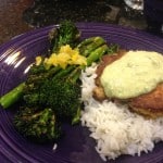Avocado sauce over gluten-free crab cakes.