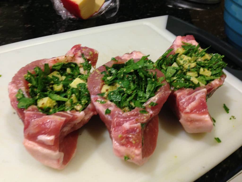 Pork chops stuffed with spinach, gouda, and mustard mix.