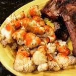 Roasted cauliflower with Buffalo wing sauce.